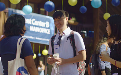 UC San Diego students chat together at a social gathering