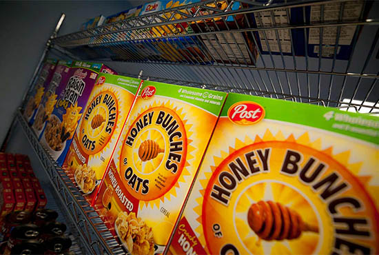 Triton Food Pantry shelves with groceries, UC San Diego campus, Basic Needs - The Hub