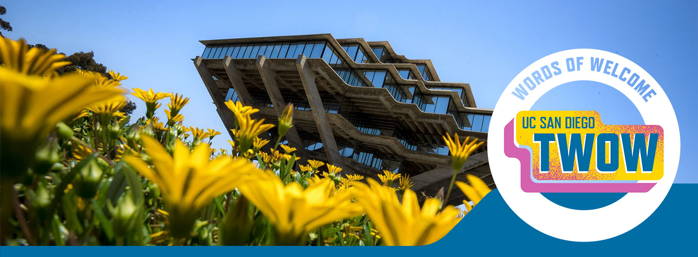 Geisel Library with bright yellow flowers in foreground